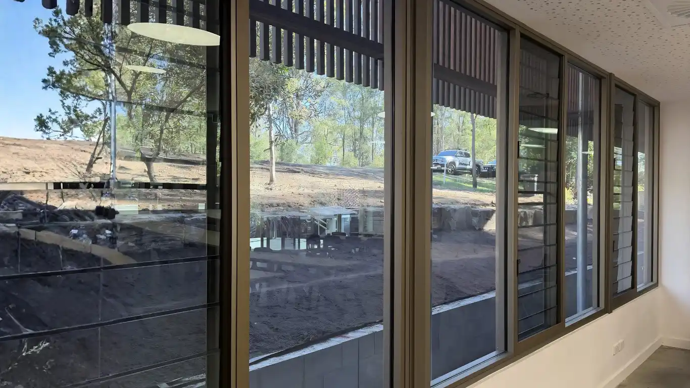 Large commercial glass windows installed by Surefit Glass in Brisbane.